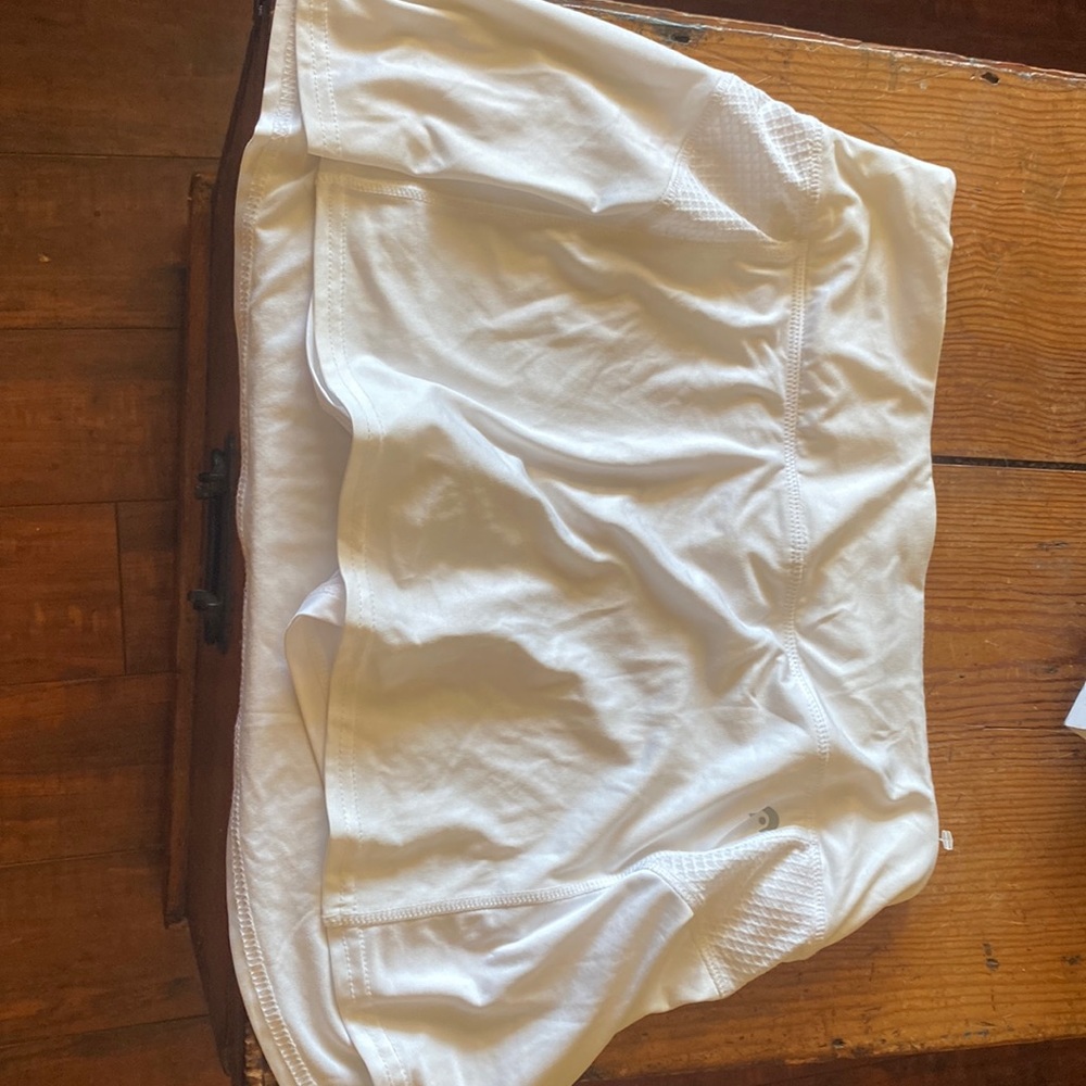 head brand, white skort, size small, worn once